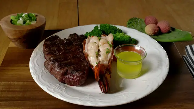 Entrecot a la brasa con bogavante y verduras